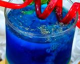 A picture of step 2 of Lychee Mocktail blue curacao.