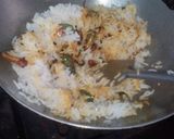 A picture of step 6 of Lemon rice and prawn curry.