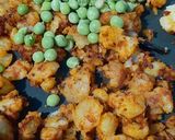 A picture of step 9 of Aloo-Matar Curry.