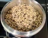 A picture of step 1 of Lobia chilla loaded with veggies.