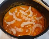 Foto del paso 4 de la receta Guiso de chipirones con gambas al azafrán