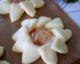 A picture of step 10 of Savory Snack Bread: Cute Sunflower Shaped Hamburger Bread.