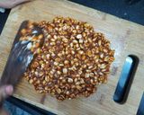 A picture of step 4 of Ground nut chikki.