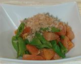 A picture of step 5 of Snap Peas and Tomatoes with Yuzu Pepper.