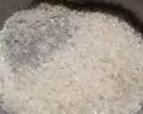 A picture of step 1 of Cooking Rice in a Pot Without it Boiling Over.