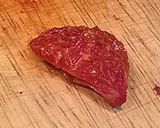 A picture of step 2 of Ajillo with Japanese Leek and Dried Tomatoes.
