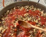 A picture of step 9 of Fideuá with Pork Secreto and Mushrooms.