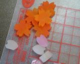 A picture of step 7 of Sakura & Doll's Festival Character Bento Hello Kitty.