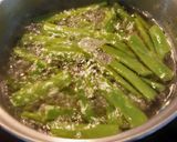 A picture of step 1 of Easy green beans, surimi and tofu stir fry.