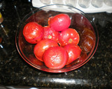 A picture of step 4 of Quick! Easy! Foolproof! How to Toast and Peel Tomatoes.