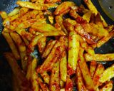 A picture of step 7 of Spicy finger chips.