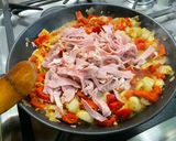 A picture of step 15 of Endive Gratin with Red Bell Peppers, Ham, Honey, and Curry.