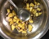 A picture of step 2 of Mooli-Aloo-Matar.
