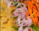 A picture of step 8 of Beloved Egg Chicken (Kathi) Roll.