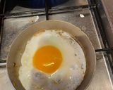 A picture of step 5 of Croque Madam or cheese and ham toast with egg.