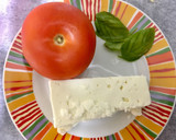 Foto del paso 4 de la receta: Bollitos de queso feta, tomate y albahaca