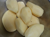 Colchón de papas con salsa de verdeo