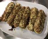 Une image de l'étape 22 de Courgettes farcies carotte jambon emmental.