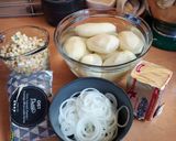 A picture of step 1 of Jalapeno Corn Scalloped Potatoes with garlic and lime bechamel.
