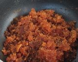 A picture of step 5 of Jaggery Amla Candy.