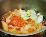 A picture of step 7 of Beetroot Carrot Soup with Caraway Dumplings.