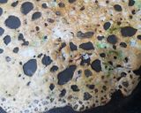 A picture of step 7 of Rava Dosa.