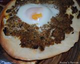 A picture of step 12 of Pizza with minced beef and egg.