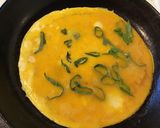 A picture of step 4 of California Farm Handmade Cottage Cheese Stuffed Omelette.