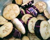 A picture of step 1 of Ring brinjals fry/bake.