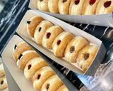 A picture of step 5 of Fuflfy donuts.