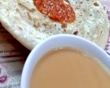 A picture of step 12 of Aalu Ka Paratha with Tamater ki chatni.