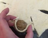 A picture of step 4 of Meatball cheese pizza.