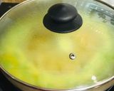A picture of step 5 of Narkel diye Bhaja Muger Dal: Bengali Style- Yellow Moong Dal with Coconut (Without Onion-Garlic).