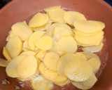 Foto del paso 5 de la receta: Tortilla de patatas con calabacín y cebolla (Sin sal)