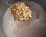 A picture of step 9 of Besan boondi raita.