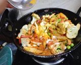 A picture of step 2 of Aloo Gobhi matar gajar ki sookhi sabji.