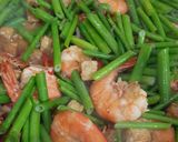Foto langkah ke 6 dari resep Tumis udang bunga bawang.