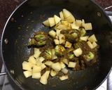 A picture of step 3 of Brinjal in black gravy.