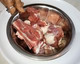 A picture of step 1 of Mutton roghan josh rice.