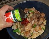 Foto del paso 7 de la receta Arroz caldoso de pollo y conejo
