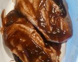 A picture of step 4 of Oven Baked BBQ pork chops.