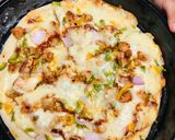 A picture of step 8 of Giant chicken tikka pizza.