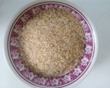 A picture of step 2 of Rice and beans with moringa leaves.