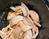 A picture of step 1 of Braised Pork with Young Coconut.