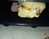 Foto del paso 3 de la receta: Sándwich con pollo asado, jamón, queso y huevos
