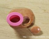 A picture of step 5 of Charaben Rilakkuma made from Mini Sausages.