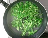 A picture of step 2 of Amazing, Unbeatable, Child-Pleasing Stir-Fried Green Bell Peppers.