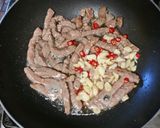 A picture of step 12 of Beef Fried Noodles (Thai style).