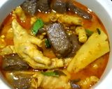 A picture of step 4 of Spicy Red Curry Chicken Feet with Pickled Bamboo Shoots.