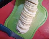 A picture of step 5 of Fried yam coated with egg and spicy fry sauce.